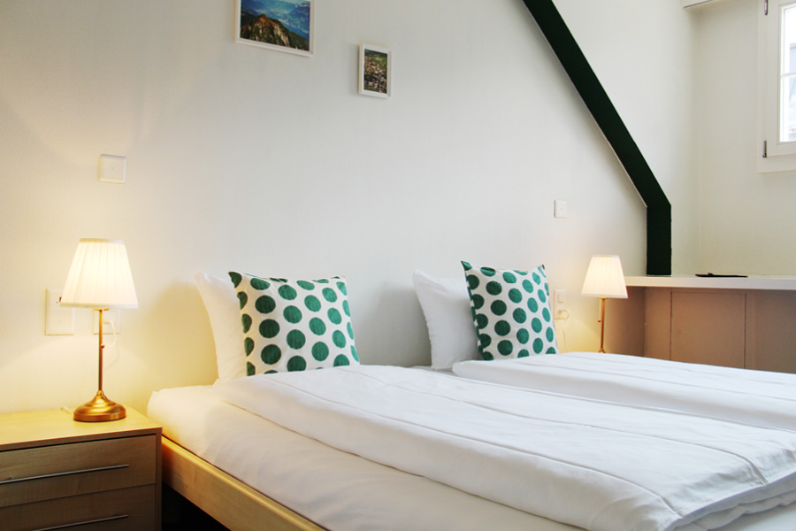 Standard Doppel- oder Einzelzimmer mit Gemeinschaftsbad